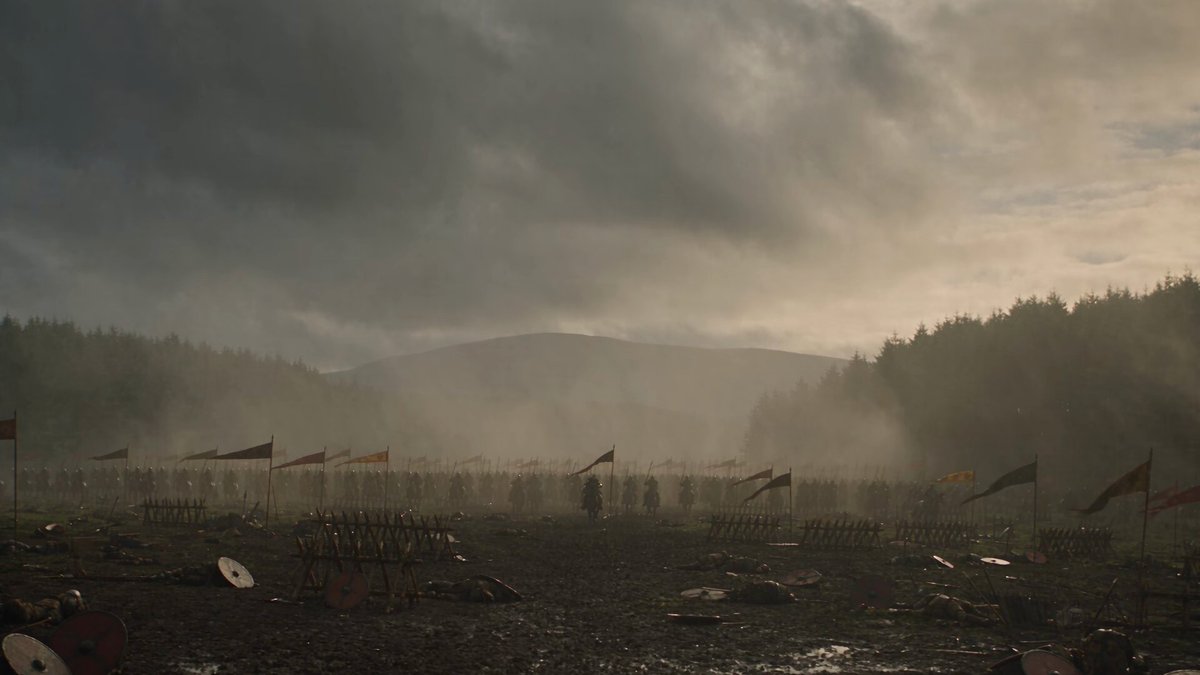 Create a 30-second ultra-photorealistic, cinematic medieval battle sequence set…