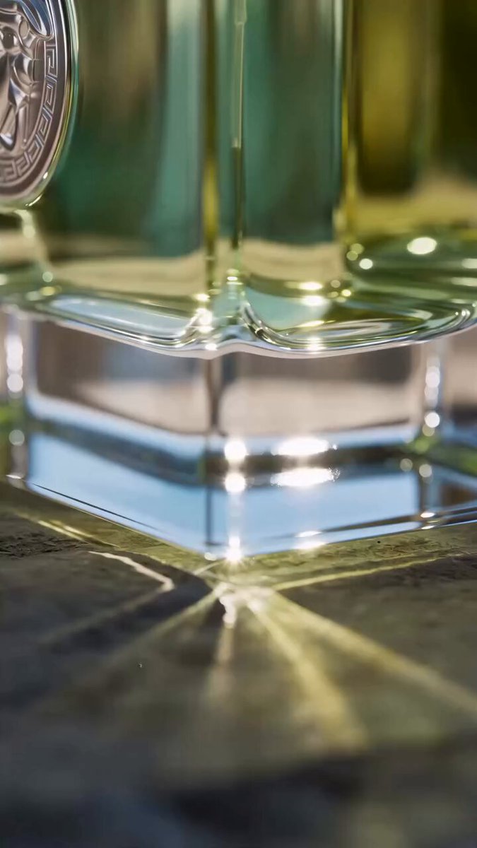 A cinematic 3D product commercial for a luxury fragrance…